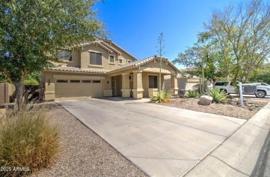This gorgeous 4 bedroom, 3 bath home with a pool in the growing on The Golf Club At Johnson Ranch in Arizona - for sale on GolfHomes.com, golf home, golf lot