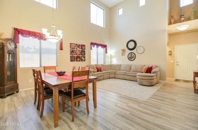 This gorgeous 4 bedroom, 3 bath home with a pool in the growing on The Golf Club At Johnson Ranch in Arizona - for sale on GolfHomes.com, golf home, golf lot