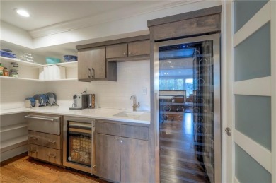 Step inside this stunning lakefront home and just say *wow* on Lake Quivira Country Club in Kansas - for sale on GolfHomes.com, golf home, golf lot