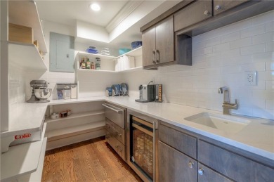 Step inside this stunning lakefront home and just say *wow* on Lake Quivira Country Club in Kansas - for sale on GolfHomes.com, golf home, golf lot