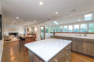 Step inside this stunning lakefront home and just say *wow* on Lake Quivira Country Club in Kansas - for sale on GolfHomes.com, golf home, golf lot