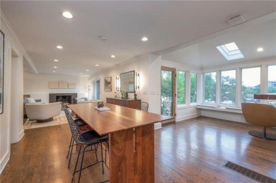 Step inside this stunning lakefront home and just say *wow* on Lake Quivira Country Club in Kansas - for sale on GolfHomes.com, golf home, golf lot