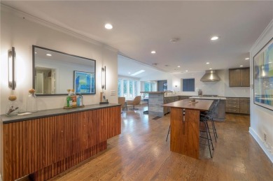 Step inside this stunning lakefront home and just say *wow* on Lake Quivira Country Club in Kansas - for sale on GolfHomes.com, golf home, golf lot