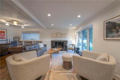 Step inside this stunning lakefront home and just say *wow* on Lake Quivira Country Club in Kansas - for sale on GolfHomes.com, golf home, golf lot