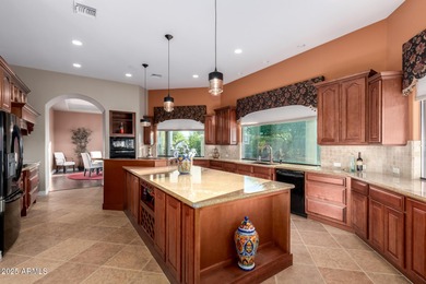 Experience luxury & comfort in this stunning residence backing on Tonto Verde Golf Club in Arizona - for sale on GolfHomes.com, golf home, golf lot