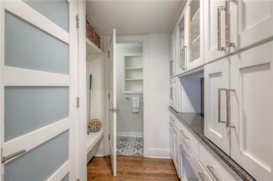 Step inside this stunning lakefront home and just say *wow* on Lake Quivira Country Club in Kansas - for sale on GolfHomes.com, golf home, golf lot