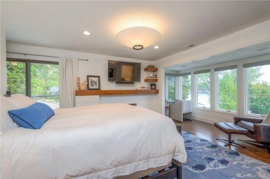 Step inside this stunning lakefront home and just say *wow* on Lake Quivira Country Club in Kansas - for sale on GolfHomes.com, golf home, golf lot