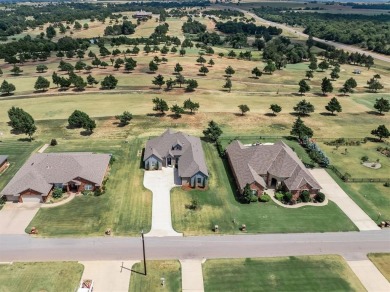 Gorgeous home located on the 15th hole of Cimarron National Golf on Cimarron National Golf Club in Oklahoma - for sale on GolfHomes.com, golf home, golf lot