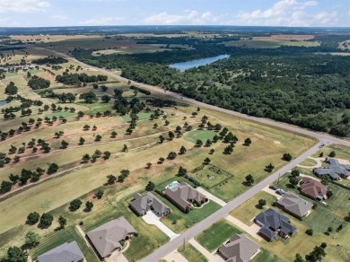 Gorgeous home located on the 15th hole of Cimarron National Golf on Cimarron National Golf Club in Oklahoma - for sale on GolfHomes.com, golf home, golf lot