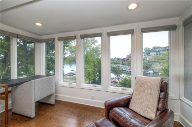 Step inside this stunning lakefront home and just say *wow* on Lake Quivira Country Club in Kansas - for sale on GolfHomes.com, golf home, golf lot