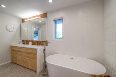 Step inside this stunning lakefront home and just say *wow* on Lake Quivira Country Club in Kansas - for sale on GolfHomes.com, golf home, golf lot