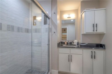 Step inside this stunning lakefront home and just say *wow* on Lake Quivira Country Club in Kansas - for sale on GolfHomes.com, golf home, golf lot