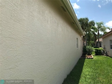 Renovated Beautiful 3br, 2ba, 2 car garage home with Lake View on St. Lucie Trail Golf Club in Florida - for sale on GolfHomes.com, golf home, golf lot