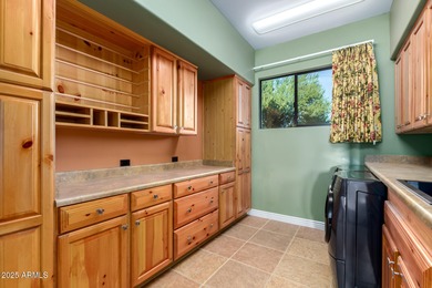 Experience luxury & comfort in this stunning residence backing on Tonto Verde Golf Club in Arizona - for sale on GolfHomes.com, golf home, golf lot