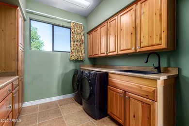 Experience luxury & comfort in this stunning residence backing on Tonto Verde Golf Club in Arizona - for sale on GolfHomes.com, golf home, golf lot