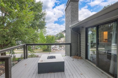 Step inside this stunning lakefront home and just say *wow* on Lake Quivira Country Club in Kansas - for sale on GolfHomes.com, golf home, golf lot