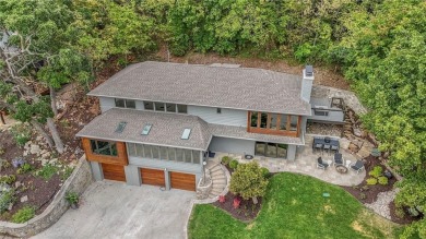Step inside this stunning lakefront home and just say *wow* on Lake Quivira Country Club in Kansas - for sale on GolfHomes.com, golf home, golf lot