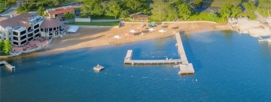 Step inside this stunning lakefront home and just say *wow* on Lake Quivira Country Club in Kansas - for sale on GolfHomes.com, golf home, golf lot
