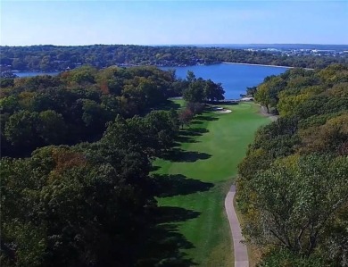 Step inside this stunning lakefront home and just say *wow* on Lake Quivira Country Club in Kansas - for sale on GolfHomes.com, golf home, golf lot