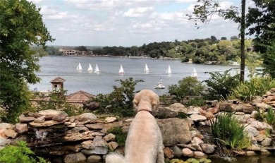 Step inside this stunning lakefront home and just say *wow* on Lake Quivira Country Club in Kansas - for sale on GolfHomes.com, golf home, golf lot