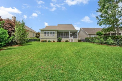 This meticulously maintained Southwood home overlooks the golf on Southwood Golf Club in Florida - for sale on GolfHomes.com, golf home, golf lot