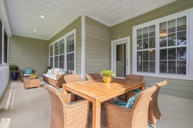 This meticulously maintained Southwood home overlooks the golf on Southwood Golf Club in Florida - for sale on GolfHomes.com, golf home, golf lot