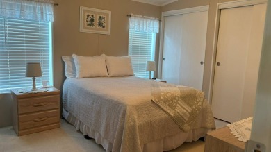 This quintessential Florida home is a perfect winter get-away or on Sabal Springs Golf and Racquet Club in Florida - for sale on GolfHomes.com, golf home, golf lot