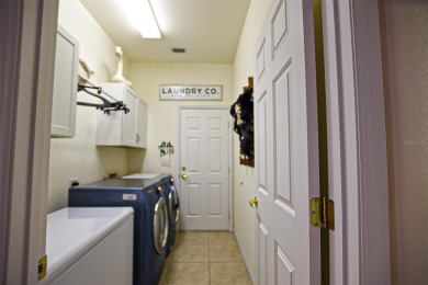 Move in ready and highly popular Santa Rosa floor plan, boasts 2 on Eagle Ridge At Spruce Creek Country Club in Florida - for sale on GolfHomes.com, golf home, golf lot