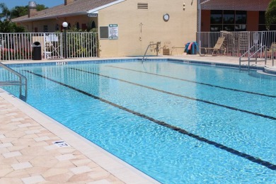 This quintessential Florida home is a perfect winter get-away or on Sabal Springs Golf and Racquet Club in Florida - for sale on GolfHomes.com, golf home, golf lot
