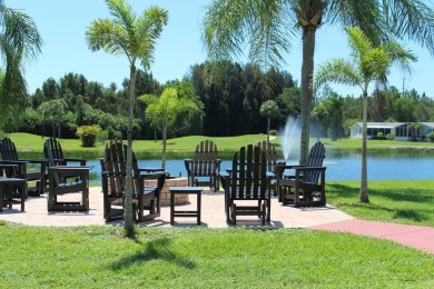 This quintessential Florida home is a perfect winter get-away or on Sabal Springs Golf and Racquet Club in Florida - for sale on GolfHomes.com, golf home, golf lot