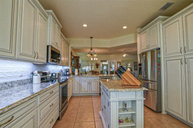 Move in ready and highly popular Santa Rosa floor plan, boasts 2 on Eagle Ridge At Spruce Creek Country Club in Florida - for sale on GolfHomes.com, golf home, golf lot
