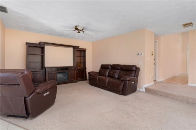 This fantastic, duplex-style townhome is located in the on Louisquisset Golf Club in Rhode Island - for sale on GolfHomes.com, golf home, golf lot