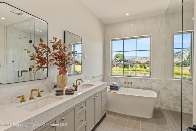Just completed, this exceptional new home sits on a quiet pond on Aspen Glen Club in Colorado - for sale on GolfHomes.com, golf home, golf lot