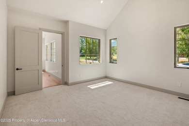 Just completed, this exceptional new home sits on a quiet pond on Aspen Glen Club in Colorado - for sale on GolfHomes.com, golf home, golf lot