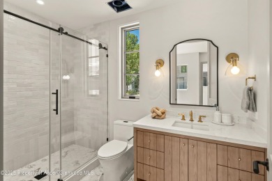 Just completed, this exceptional new home sits on a quiet pond on Aspen Glen Club in Colorado - for sale on GolfHomes.com, golf home, golf lot