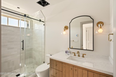Just completed, this exceptional new home sits on a quiet pond on Aspen Glen Club in Colorado - for sale on GolfHomes.com, golf home, golf lot