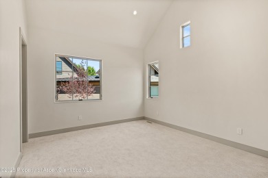 Just completed, this exceptional new home sits on a quiet pond on Aspen Glen Club in Colorado - for sale on GolfHomes.com, golf home, golf lot