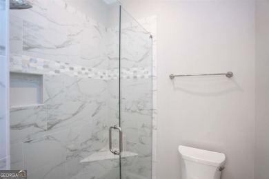 Impeccably Redesigned Custom Golf Home on the Creek Course at on Reynolds Lake Oconee - The Oconee in Georgia - for sale on GolfHomes.com, golf home, golf lot