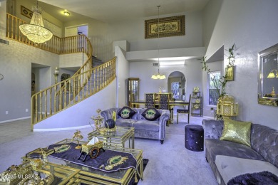 Discover luxurious living in this elegant 5-bedroom+den on El Conquistador Country Club - Conquistador in Arizona - for sale on GolfHomes.com, golf home, golf lot