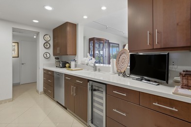 This stunning two-bedroom, two-bathroom condo features a on Desert Island Golf and Country Club in California - for sale on GolfHomes.com, golf home, golf lot