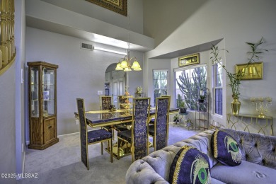Discover luxurious living in this elegant 5-bedroom+den on El Conquistador Country Club - Conquistador in Arizona - for sale on GolfHomes.com, golf home, golf lot