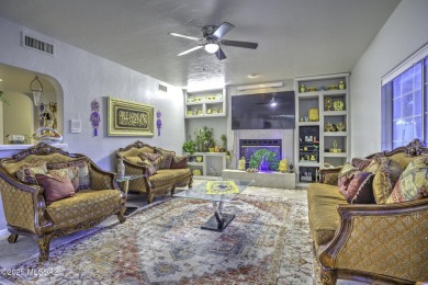 Discover luxurious living in this elegant 5-bedroom+den on El Conquistador Country Club - Conquistador in Arizona - for sale on GolfHomes.com, golf home, golf lot