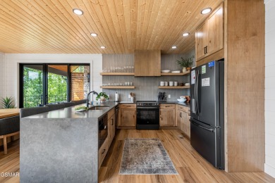 Experience true mountain luxury in this stunning 3-bedroom on Bent Creek Golf Course in Tennessee - for sale on GolfHomes.com, golf home, golf lot