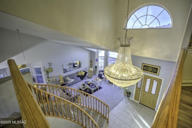 Discover luxurious living in this elegant 5-bedroom+den on El Conquistador Country Club - Conquistador in Arizona - for sale on GolfHomes.com, golf home, golf lot
