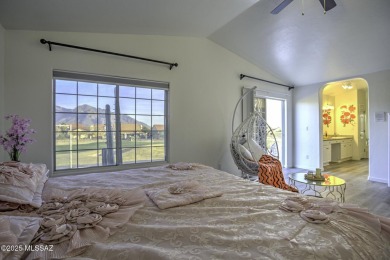 Discover luxurious living in this elegant 5-bedroom+den on El Conquistador Country Club - Conquistador in Arizona - for sale on GolfHomes.com, golf home, golf lot