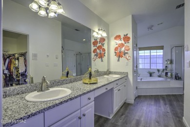 Discover luxurious living in this elegant 5-bedroom+den on El Conquistador Country Club - Conquistador in Arizona - for sale on GolfHomes.com, golf home, golf lot