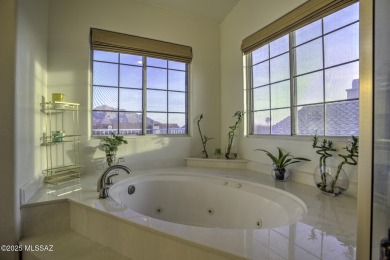 Discover luxurious living in this elegant 5-bedroom+den on El Conquistador Country Club - Conquistador in Arizona - for sale on GolfHomes.com, golf home, golf lot