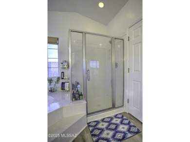 Discover luxurious living in this elegant 5-bedroom+den on El Conquistador Country Club - Conquistador in Arizona - for sale on GolfHomes.com, golf home, golf lot