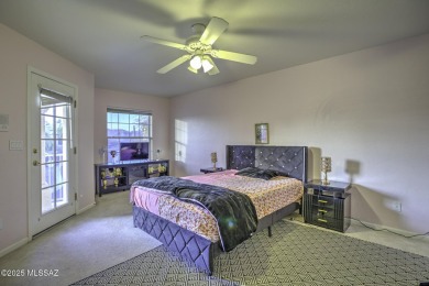 Discover luxurious living in this elegant 5-bedroom+den on El Conquistador Country Club - Conquistador in Arizona - for sale on GolfHomes.com, golf home, golf lot
