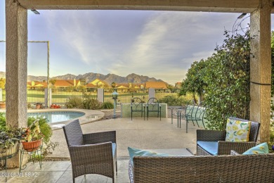 Discover luxurious living in this elegant 5-bedroom+den on El Conquistador Country Club - Conquistador in Arizona - for sale on GolfHomes.com, golf home, golf lot